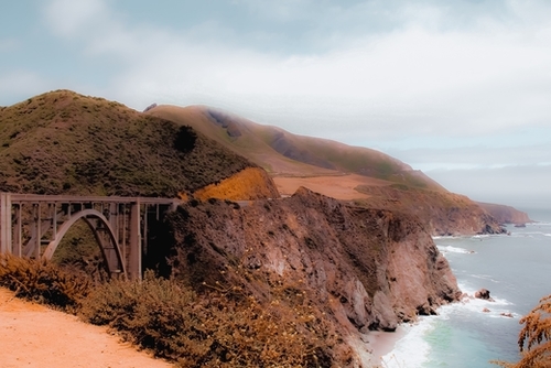 Bridge and mountain with ocean view at Bixby Creek Bridge, Big Sur, Highway 1, California, USA Mural by Timmy333