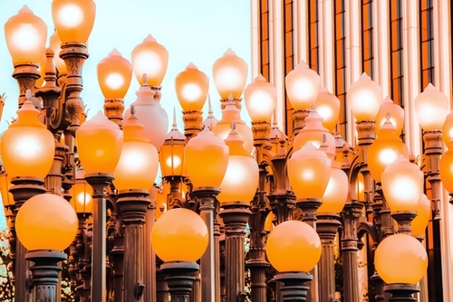 Urban lights pole with blue sky at LACMA art museum, Los Angeles, California, USA Mural by Timmy333