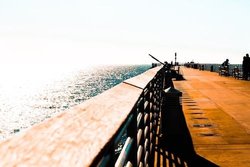 Pier with blue sky at Manhattan Beach, California, USA Mural by Timmy333