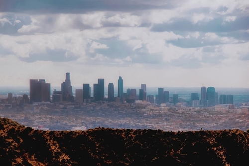 Los Angeles city with blue cloudy sky at Los Angeles, California, USA Mural by Timmy333