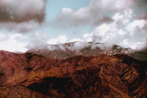 View from the hiking trail with mountain view and blue cloudy sky to Hollywood sign Los Angeles California USA Mural by Timmy333