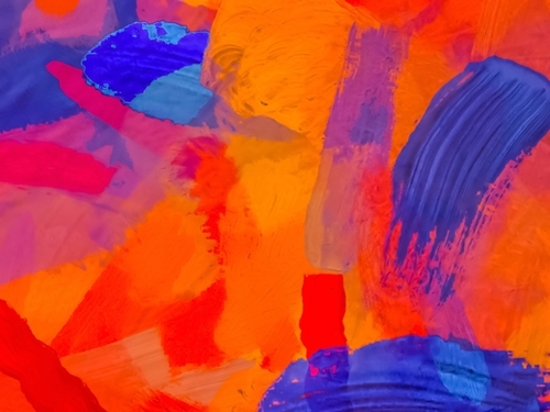 splash painting texture abstract background in orange blue red Mural by Timmy333