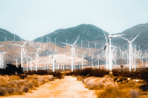 Wind turbine in the desert with mountain background at Kern County California USA  Mural by Timmy333