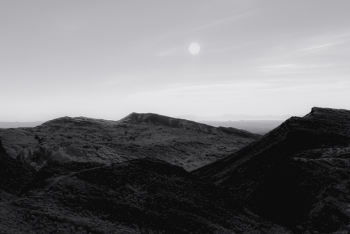mountain in the desert at Red rock canyon state park California in black and white Mural by Timmy333