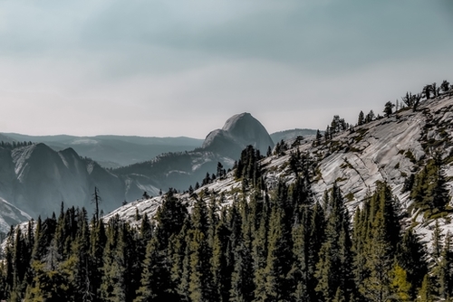 mountains with blue cloudy sky at Yosemite national park California USA Mural by Timmy333