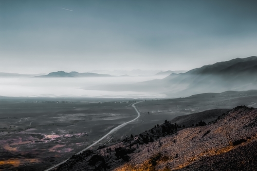 mountains layer with foggy blue sky in California USA Mural by Timmy333