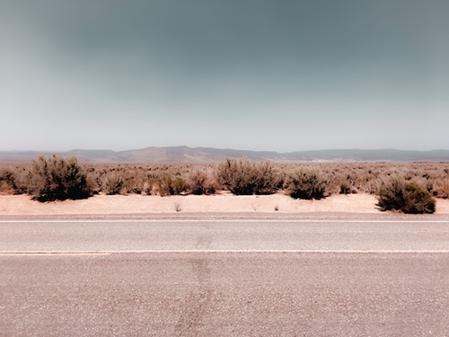 Road in the desert with blue sky in California USA Mural by Timmy333