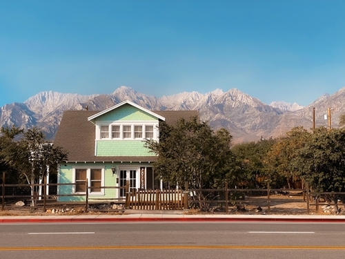 blue house with mountain view background in California USA Mural by Timmy333