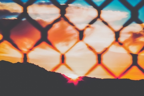 summer sunset with mountain view and cloudy sky Mural by Timmy333