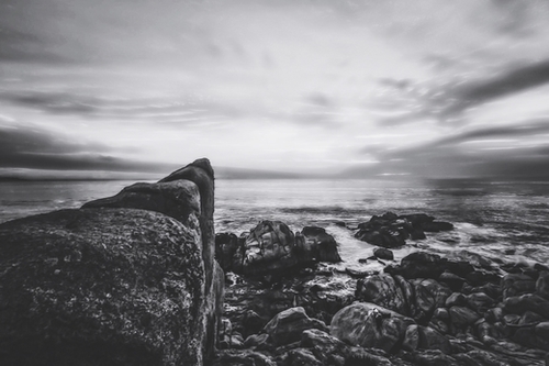 ocean sunset view with beautiful blue cloudy sky in black and white Mural by Timmy333