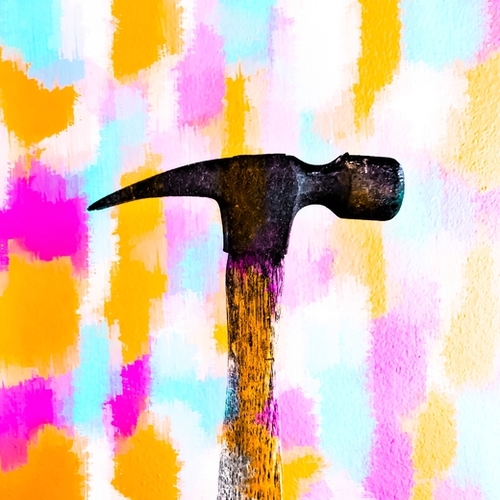 hammer with colorful painting abstract background in pink orange blue Mural by Timmy333