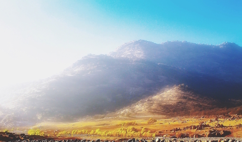 mountain with strong summer sunlight and blue sky Mural by Timmy333