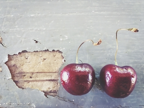 fresh cherry on the wooden table Mural by Timmy333